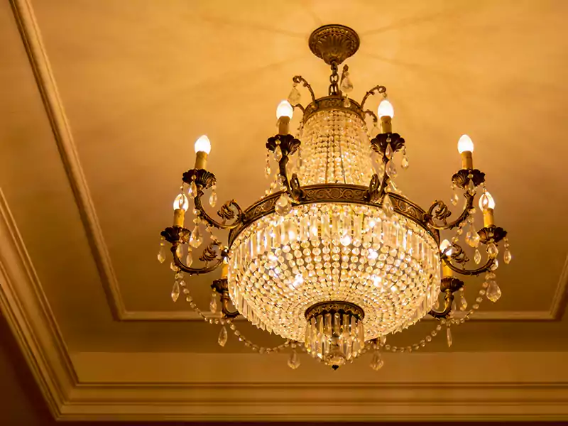 a chandelier installed on a high ceiling